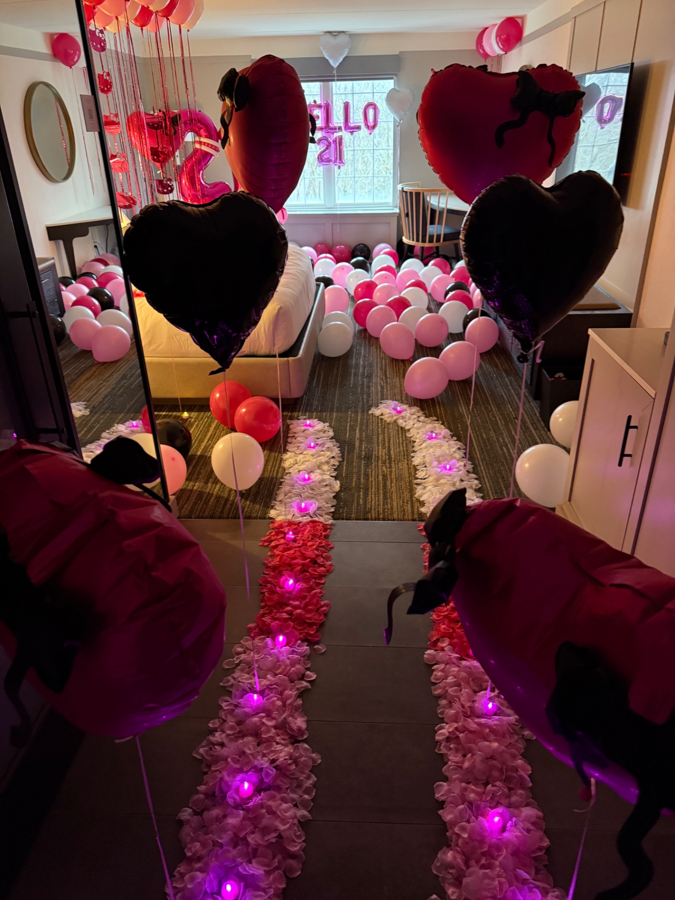 Hello 21 pink rose petal pathway with heart balloons